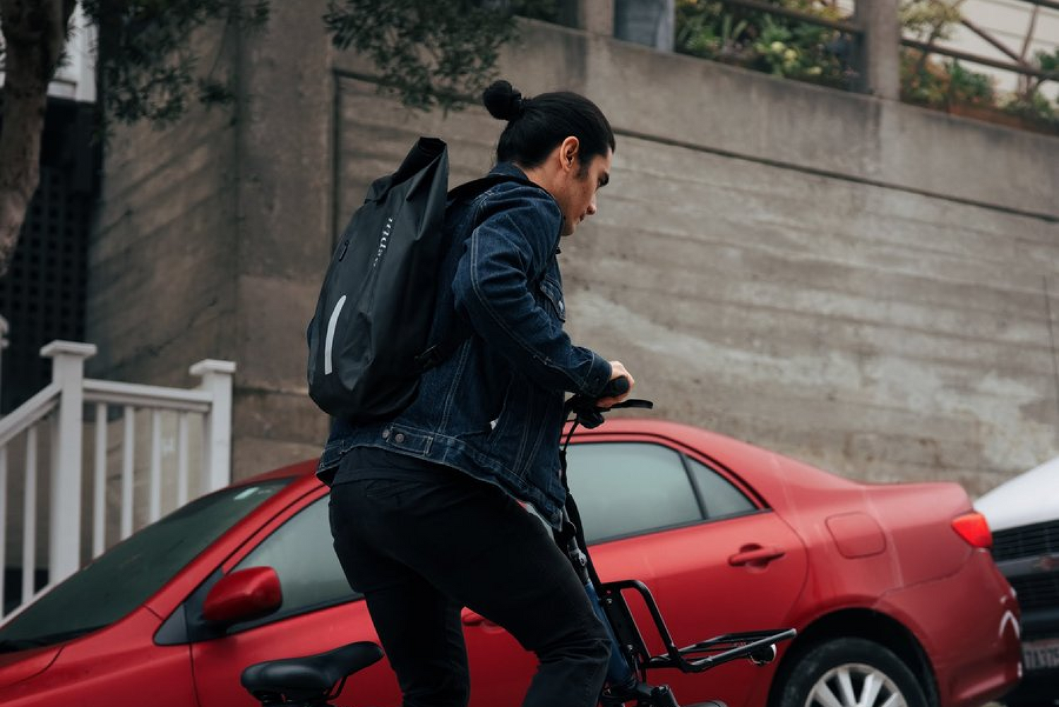 man riding electric bike uphill