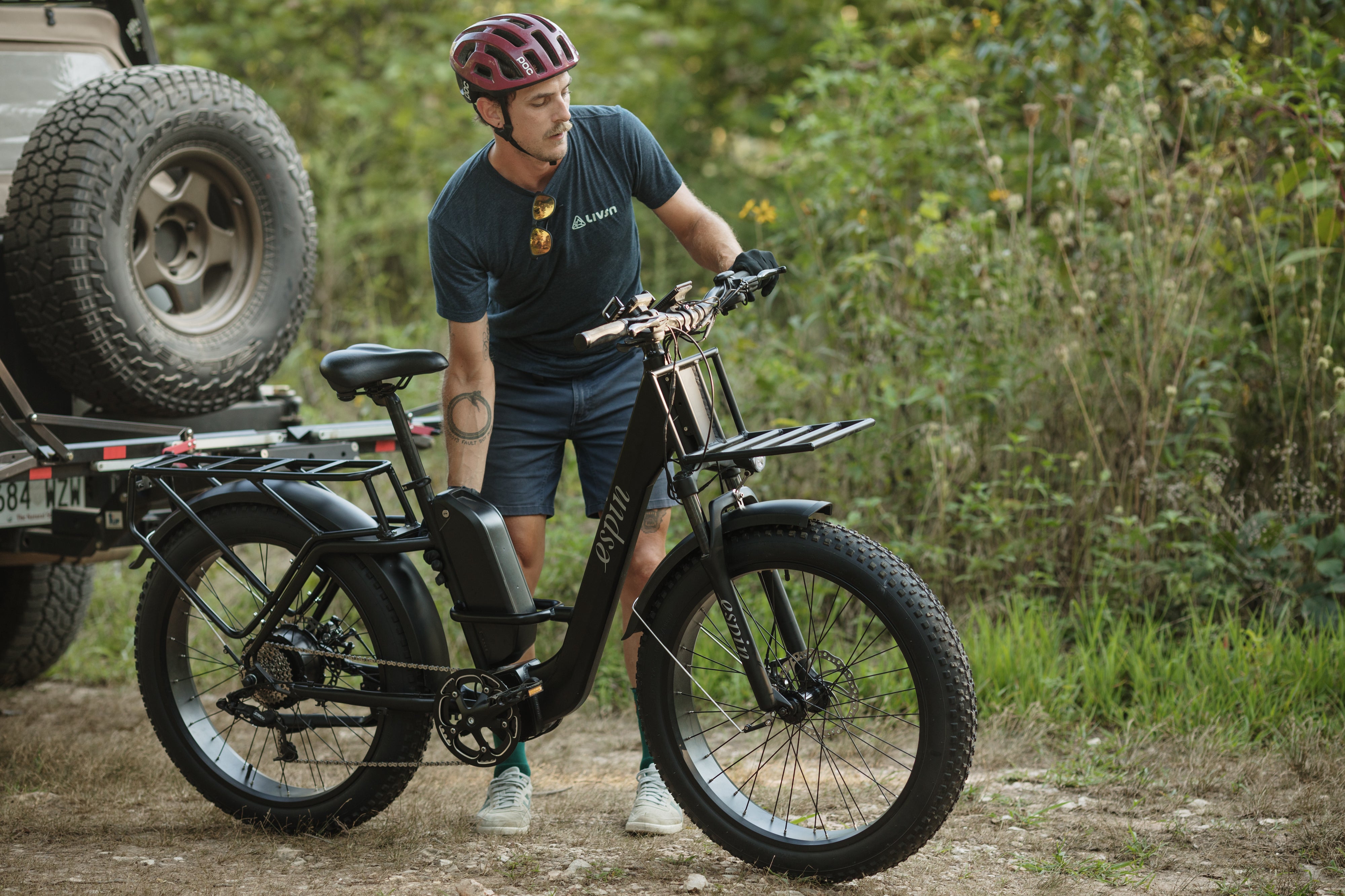 man riding e-bike